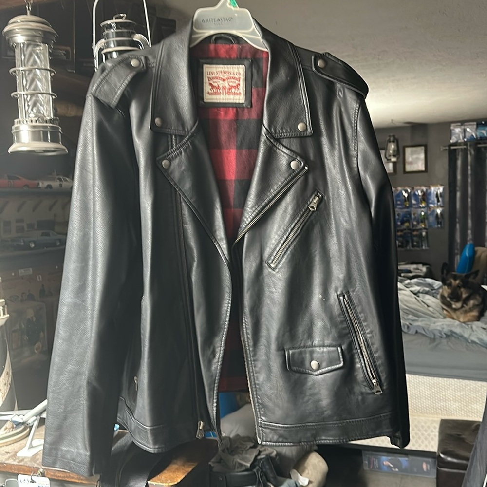 Levi’s black leather jacket.